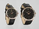 Elegant men's and women's watch set in rose gold look with genuine leather strap