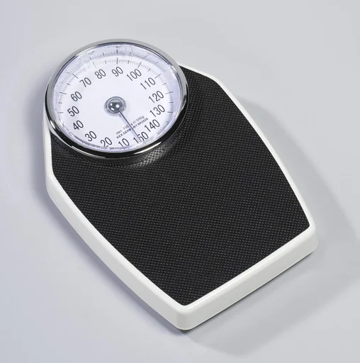 "Doctor's scale, mechanical, white/black image"