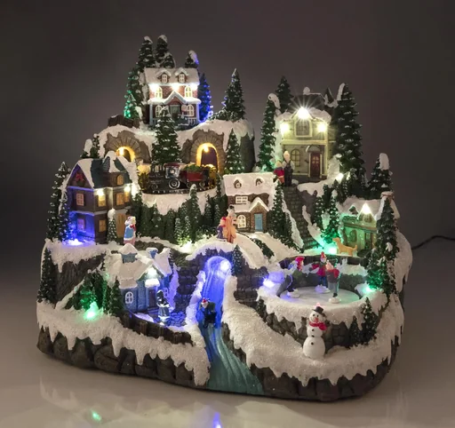 "Christmas village scene with lighting and music image"