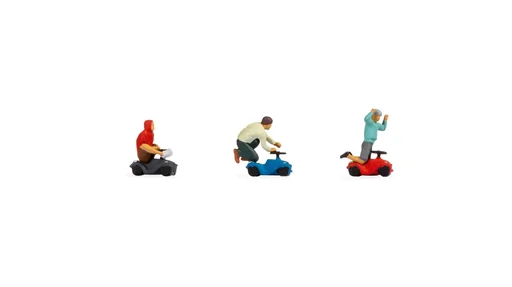 "Bobby Car race, 3 figures on Bobby Car, H0 gauge image"