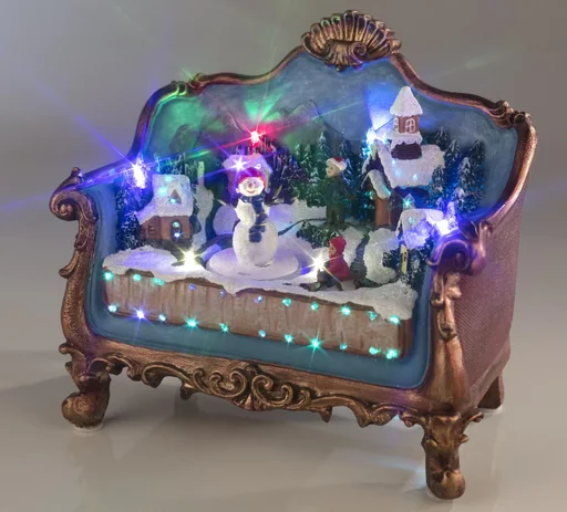 "Sofa with Christmas scene with lighting and music image"
