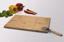 Pizza cutting board with pizza cutter