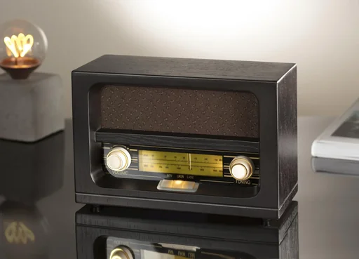 "Nostalgic radio with real wood case and amber-colored buttons image"