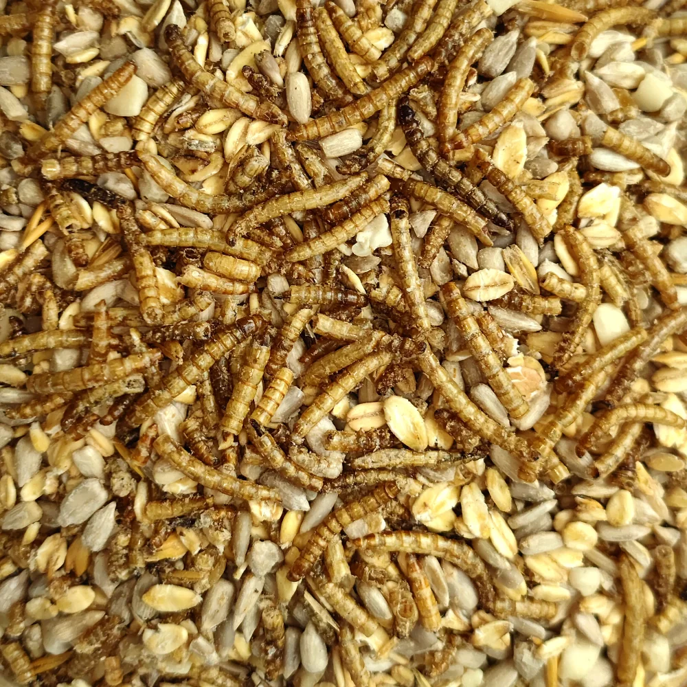 "Vogelvoer 20 kg, deluxe met meelwormen, schalenloos voor wildvogels, strooivoer image"