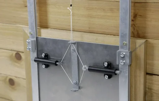 "Self-locking device for automatic chicken door image"