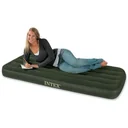 Small one-person air bed with built-in foot pump